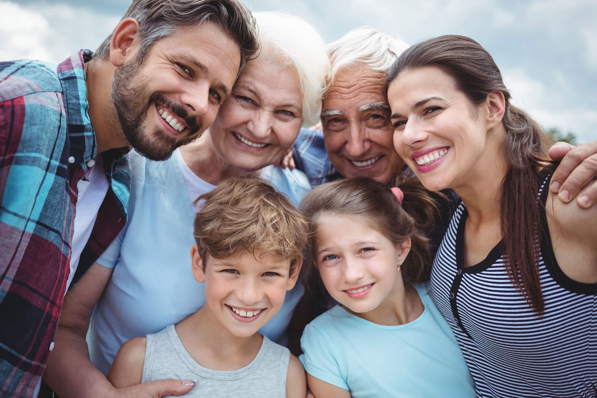 Family of multiple ages receiving dental care at Dr. Patel Dentistry